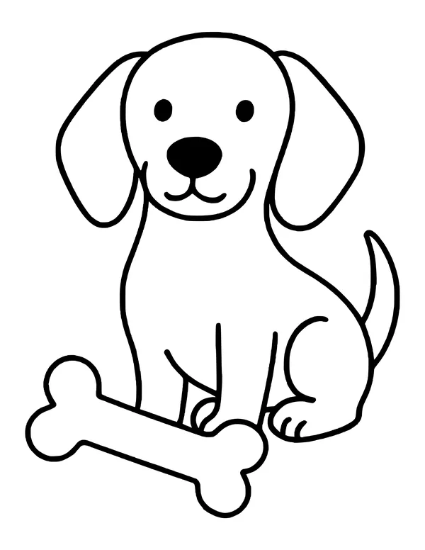 Smiling puppy with long ears and a large bone at its paws